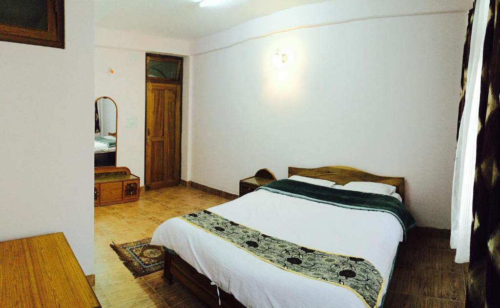 Posteľ alebo postele v izbe v ubytovaní Deki Lodge