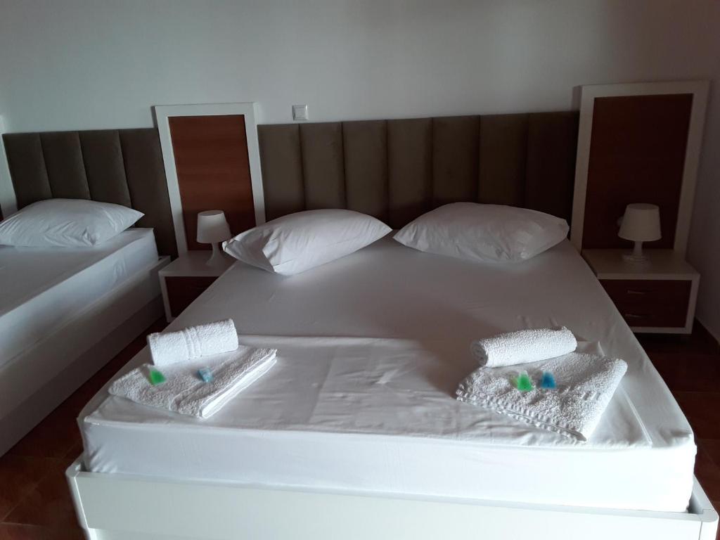Postel nebo postele na pokoji v ubytování Hotel Riviera