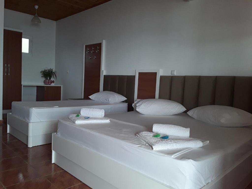 Postel nebo postele na pokoji v ubytování Hotel Riviera