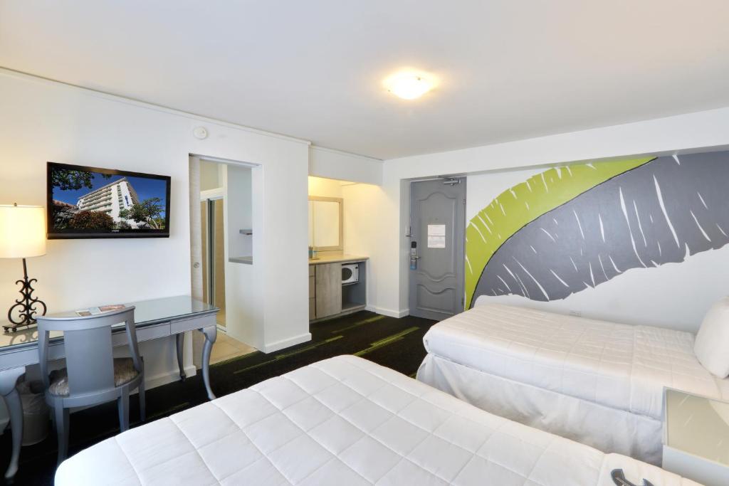 Postel nebo postele na pokoji v ubytování Hotel Miramar