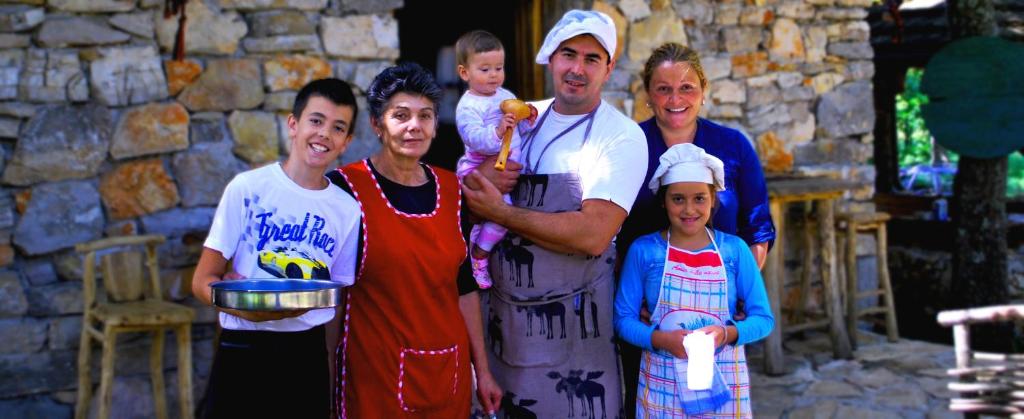 a group of people posing for a picture at Etno Selo Dodig in Drvar