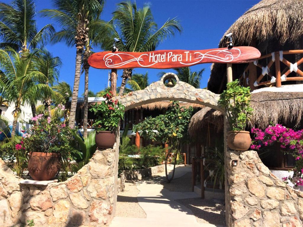 a sign that reads hotel farrington it at Hotel Para Ti - Adults Only in Holbox Island