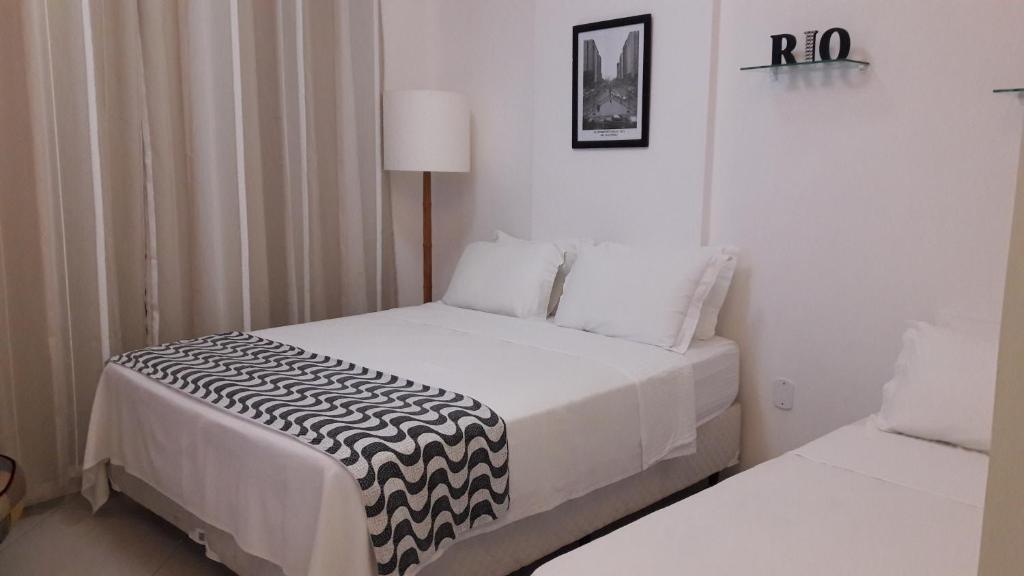 Cama o camas de una habitación en ATLANTICO Apartamentos em Copacabana 2