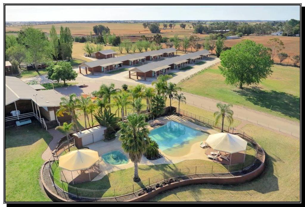 an aerial view of a resort with a swimming pool at Hilltop Resort in Swan Hill