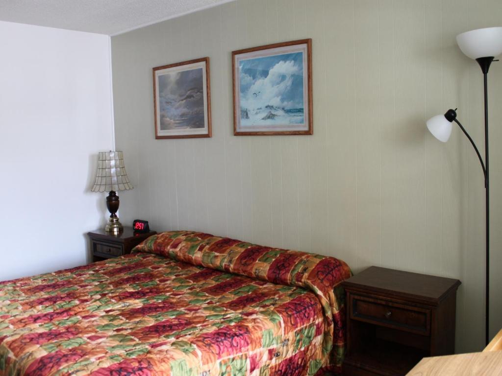 Postel nebo postele na pokoji v ubytování Motel 101