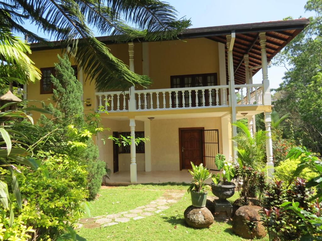 a view of the front of a house at Hantana Forest Reserve Inn in Kandy