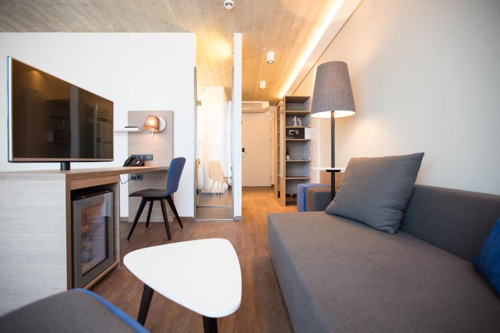 TV a/nebo společenská místnost v ubytování arte Hotel Kufstein