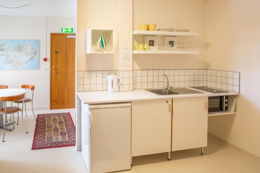 Kuchyň nebo kuchyňský kout v ubytování Guesthouse Sunna