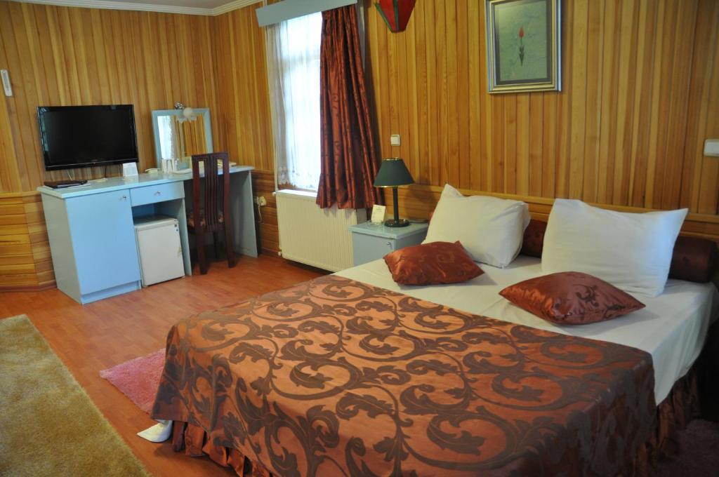 Ulasan Hotel Caravan Camping - Quarto Duplo Com Vista Para O Jardim