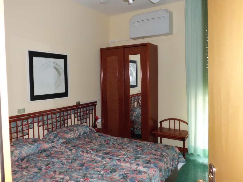 Postel nebo postele na pokoji v ubytování Hotel 5 Terre