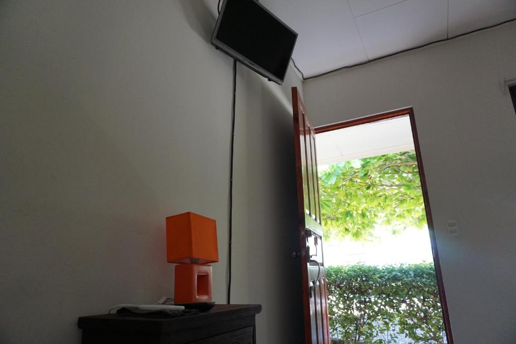 TV a/nebo společenská místnost v ubytování Villa Vilar