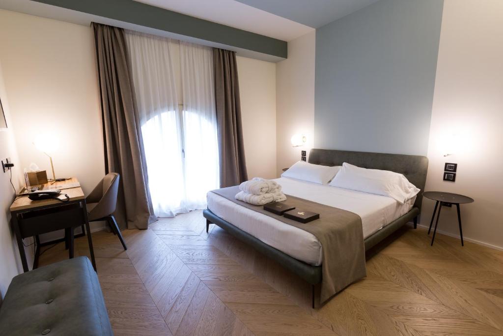 Postel nebo postele na pokoji v ubytování Hotel Silla