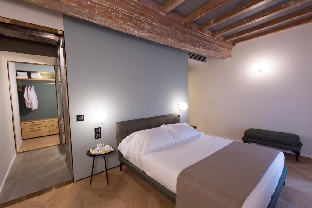 Postel nebo postele na pokoji v ubytování Hotel Silla