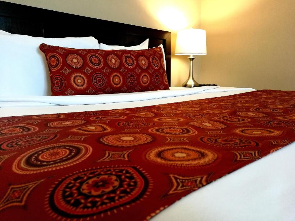 Postel nebo postele na pokoji v ubytování The Wilshire Grand Hotel