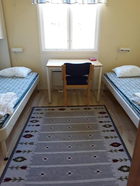 Postel nebo postele na pokoji v ubytování Stegeborgsgården
