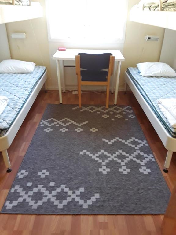 Postel nebo postele na pokoji v ubytování Stegeborgsgården