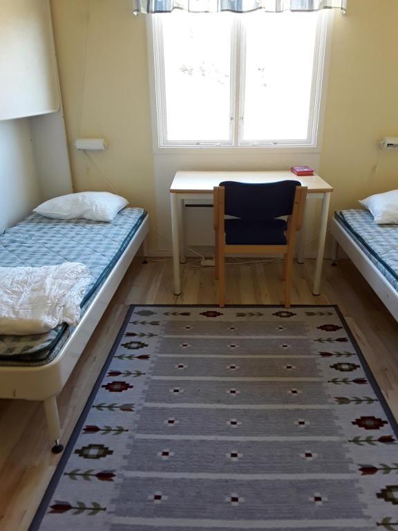Postel nebo postele na pokoji v ubytování Stegeborgsgården