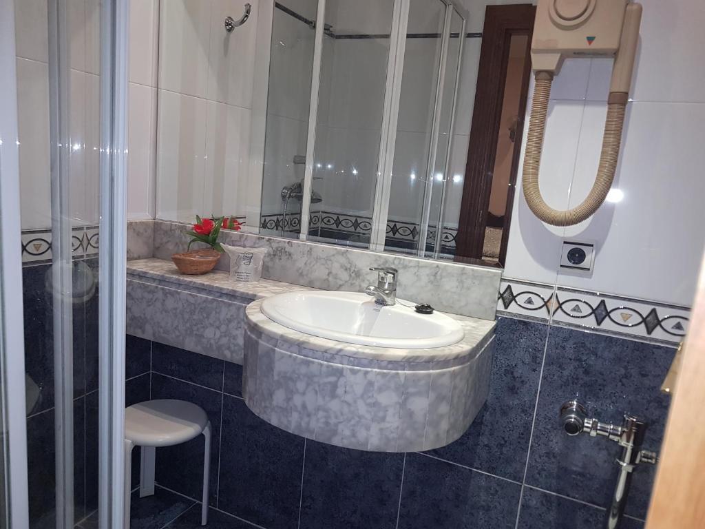 Koupelna v ubytování Hotel Castellano I