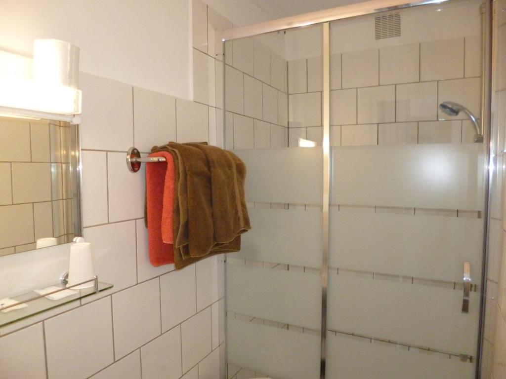 Koupelna v ubytování Hôtel le Calypso