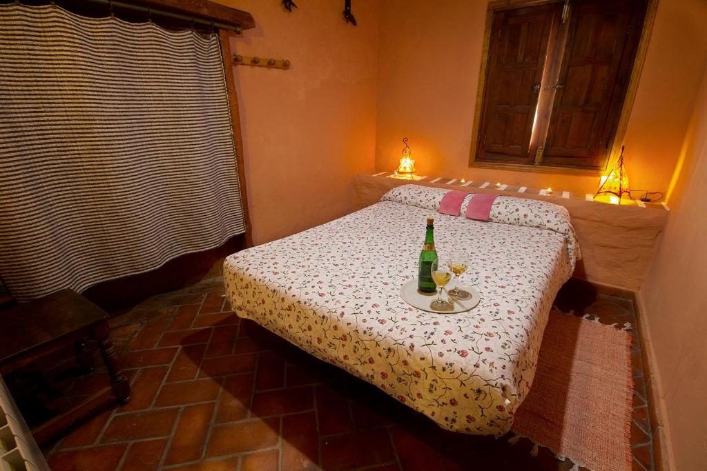 Łóżko lub łóżka w pokoju w obiekcie Apartamentos Jaronil