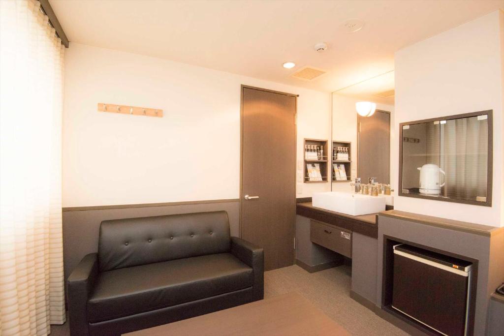 Kuchyň nebo kuchyňský kout v ubytování Hotel Double Funabashi