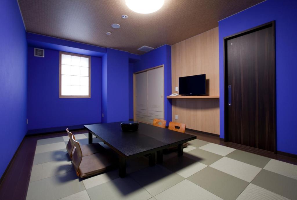 TV a/nebo společenská místnost v ubytování Natural SPA, Kanazawa Hotel Yumenoyu