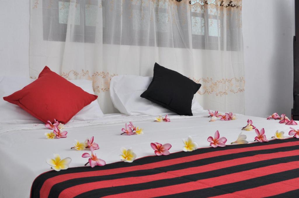 Postel nebo postele na pokoji v ubytování TMS Beach House