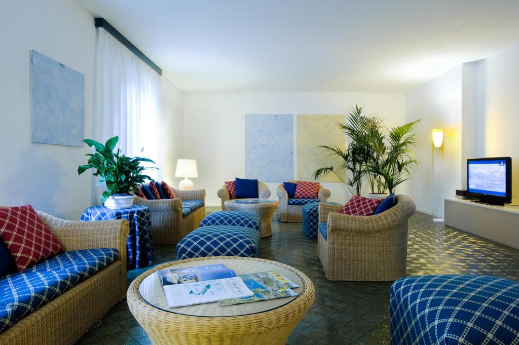 Posezení v ubytování Hotel Club Lacona