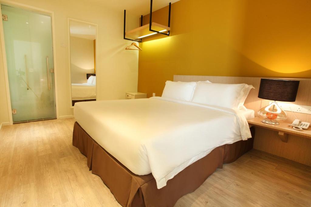 Postel nebo postele na pokoji v ubytování SGI Vacation Club Hotel