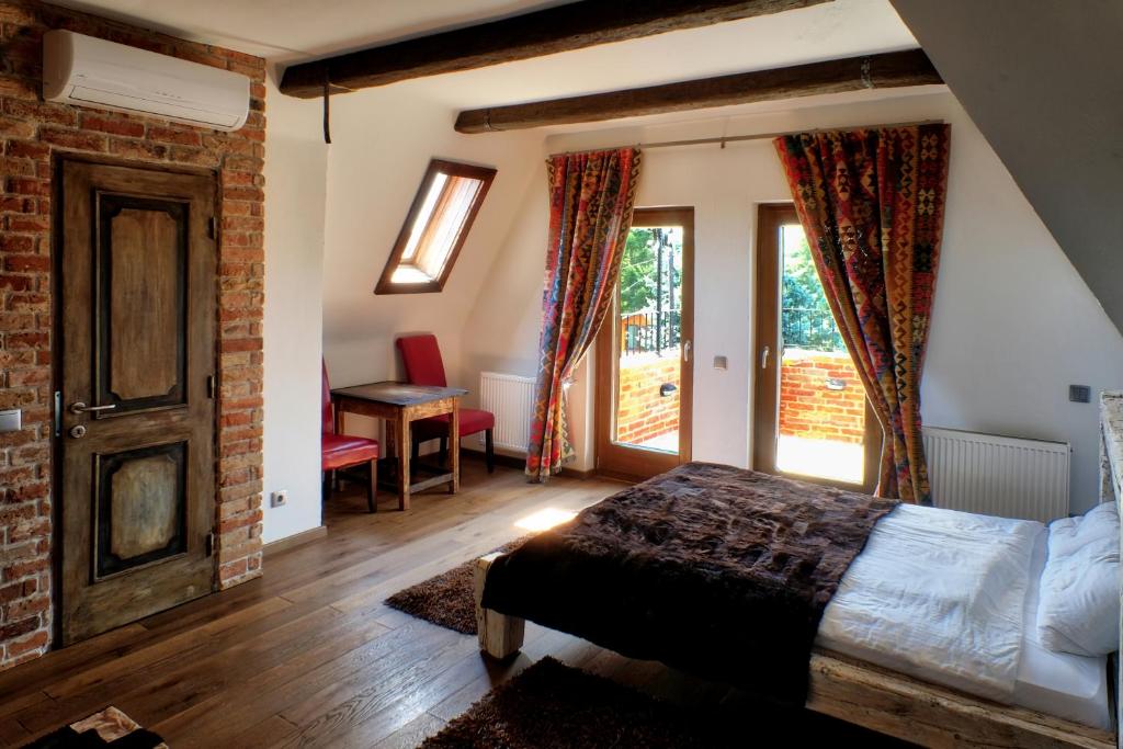 Postel nebo postele na pokoji v ubytování Vintage Home Vendégház