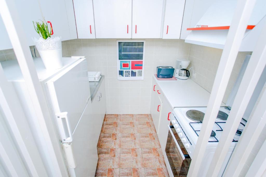 Kuchyň nebo kuchyňský kout v ubytování Apartman uz More