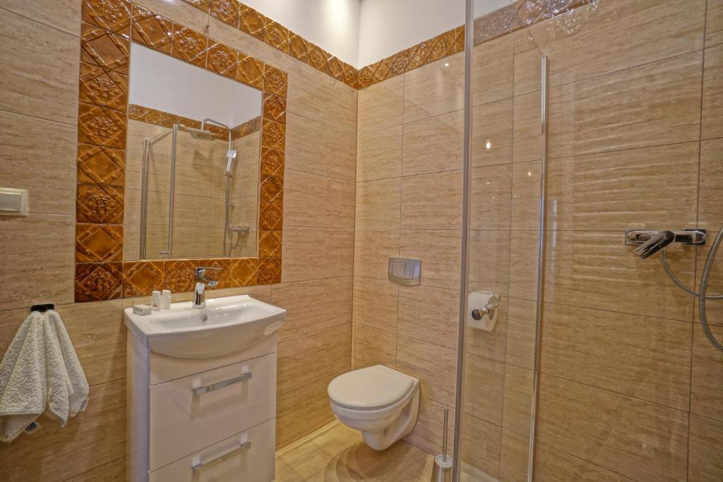 Kúpeľňa v ubytovaní Apartamenty Grodzka 8