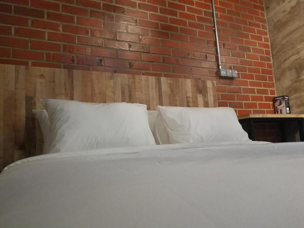 Postel nebo postele na pokoji v ubytování The Rise Room
