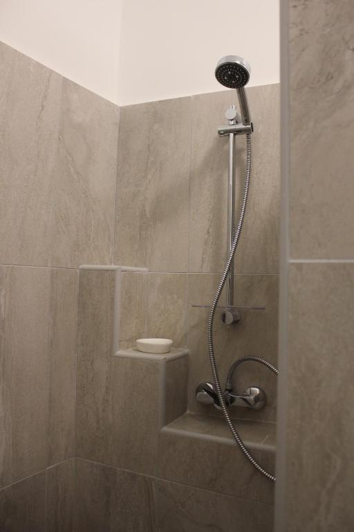 Kúpeľňa v ubytovaní Óváros Apartman