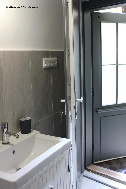 Kúpeľňa v ubytovaní Óváros Apartman