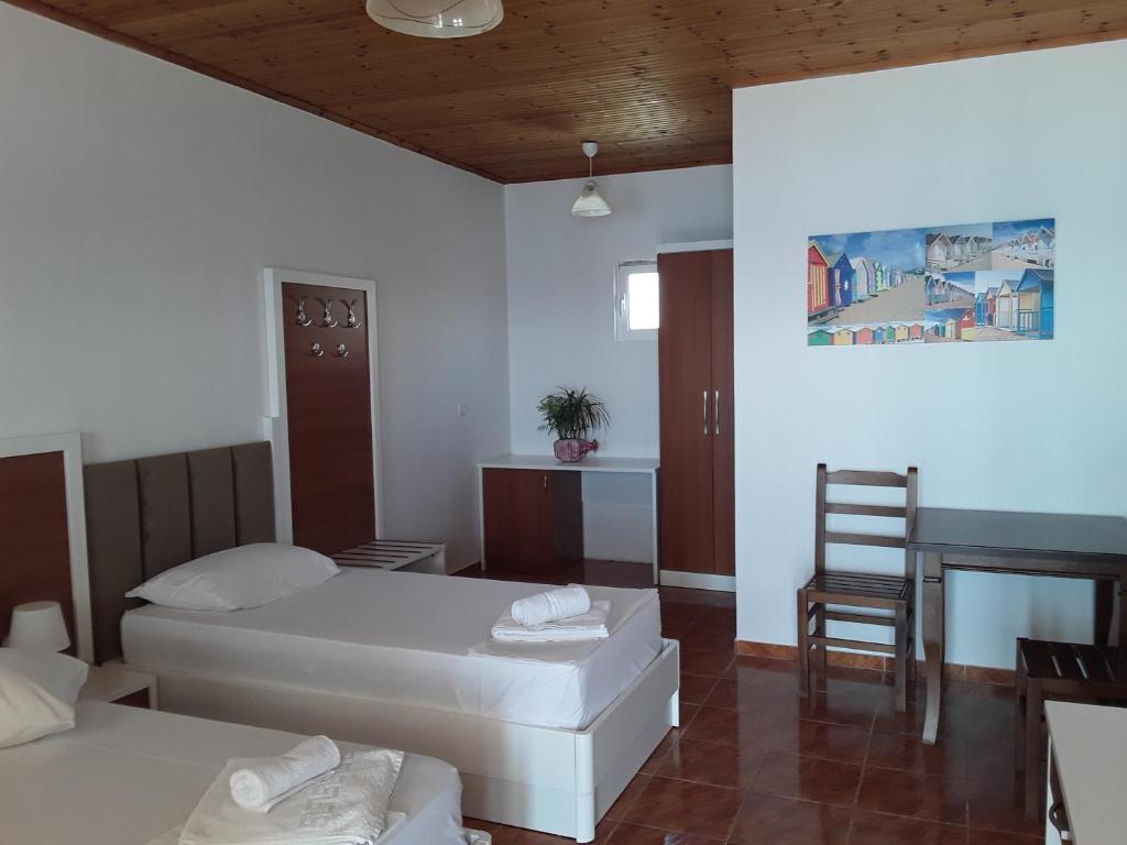 Postel nebo postele na pokoji v ubytování Hotel Riviera