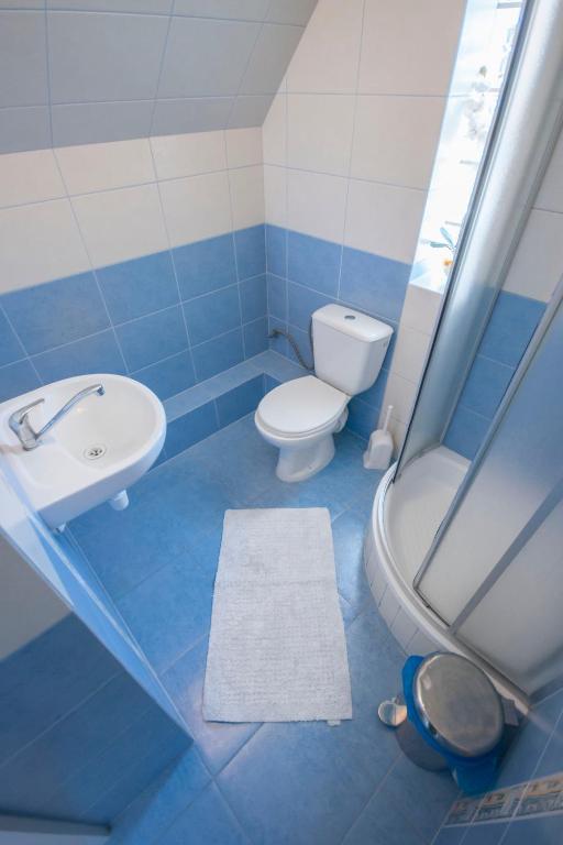 Koupelna v ubytování Roza Wiatrow