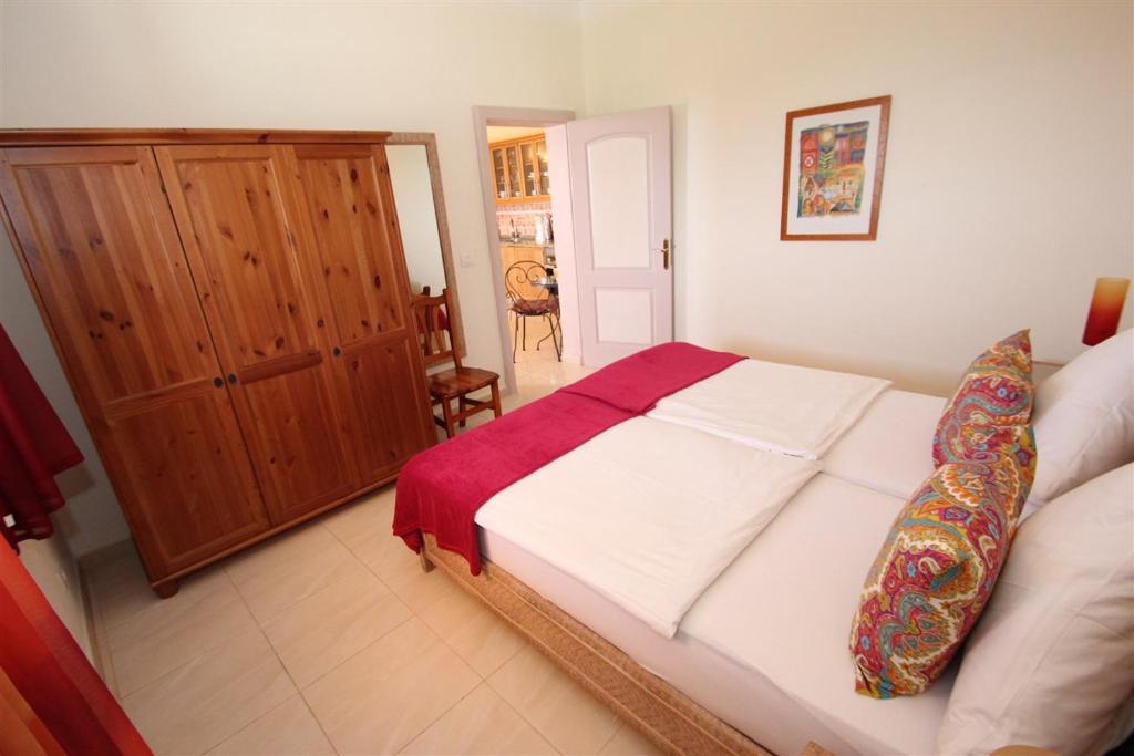 Postel nebo postele na pokoji v ubytování Suite Mariposa Finca Montimar