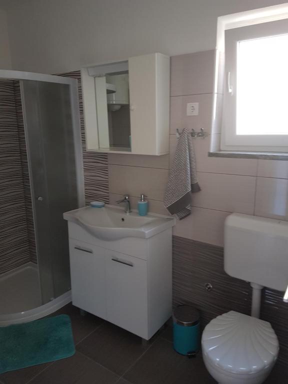 Kúpeľňa v ubytovaní Apartman Borna