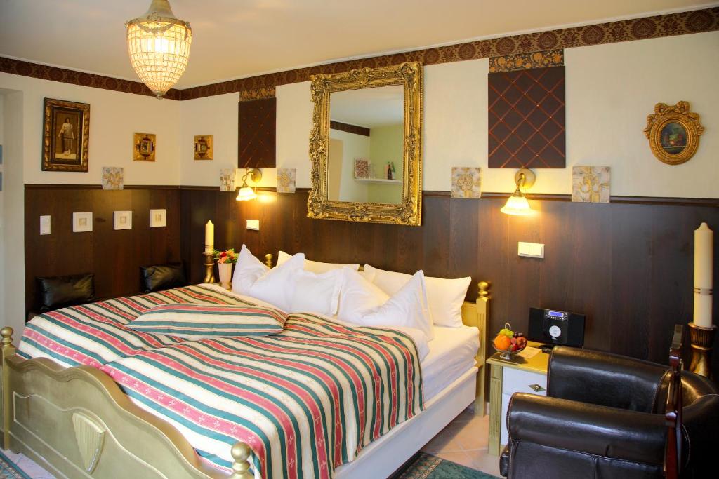 Postel nebo postele na pokoji v ubytování Hotel Don Giovanni