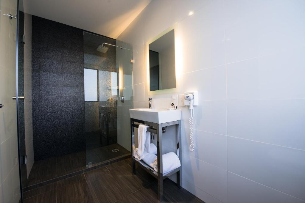 Koupelna v ubytování Hotel Perla Central