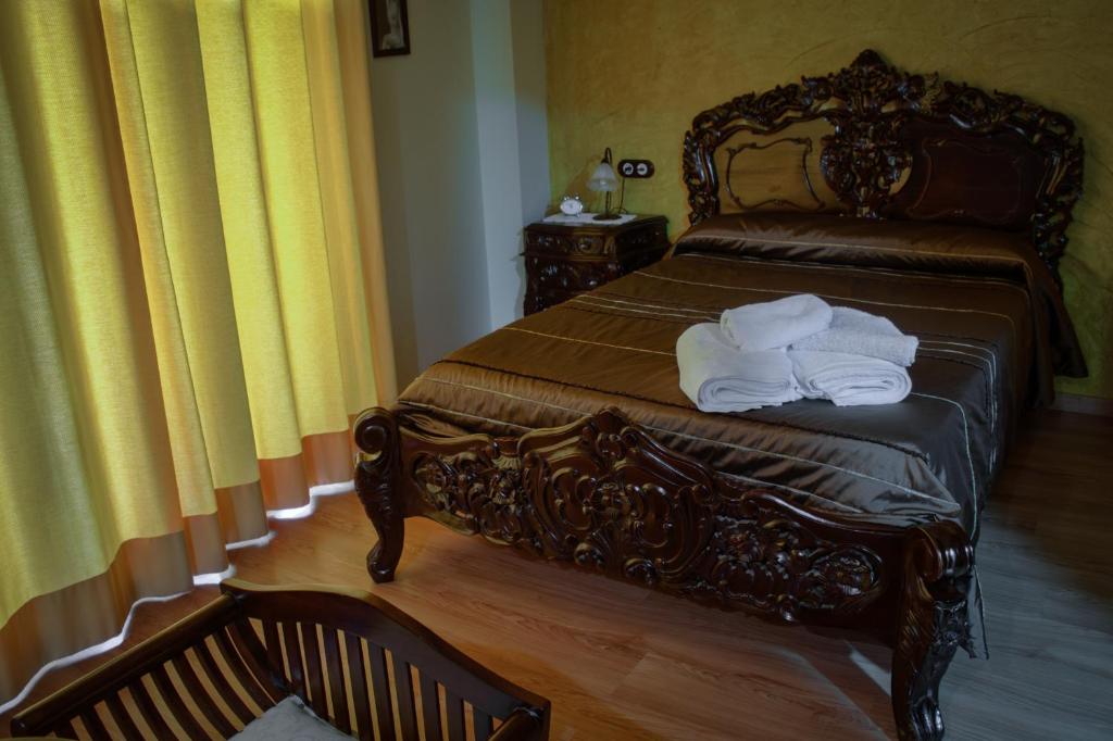 Postel nebo postele na pokoji v ubytování Casa Rural Teresa