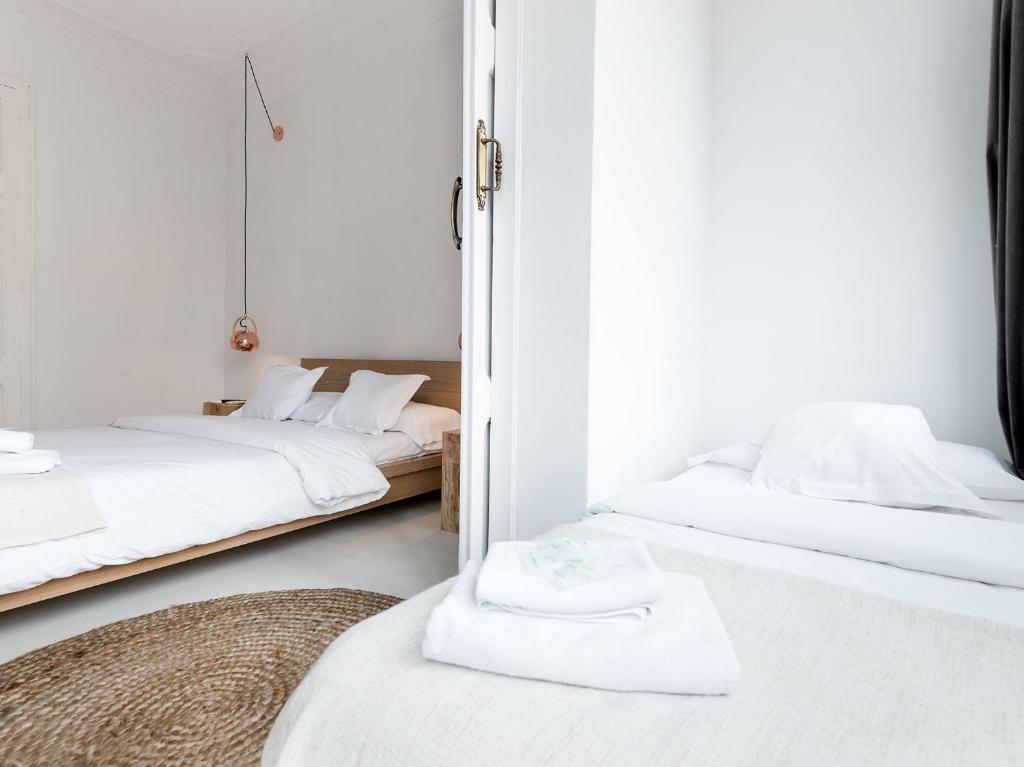 A bed or beds in a room at Bruc & Bruc