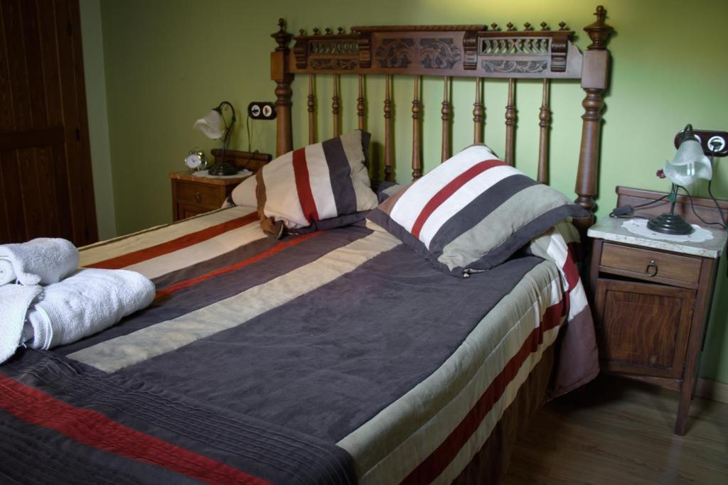Postel nebo postele na pokoji v ubytování Casa Rural Teresa