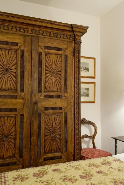 Postel nebo postele na pokoji v ubytování Hotel Lucrezia