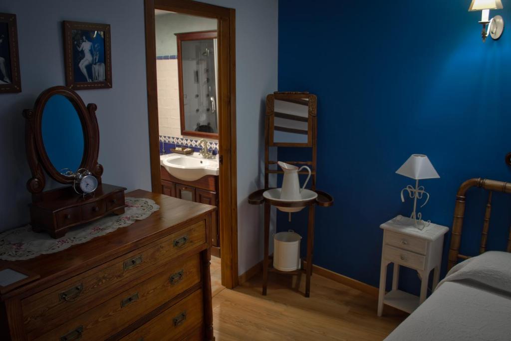 Postel nebo postele na pokoji v ubytování Casa Rural Teresa