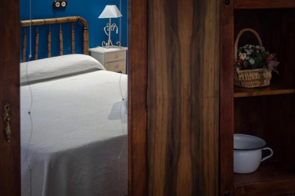 Postel nebo postele na pokoji v ubytování Casa Rural Teresa