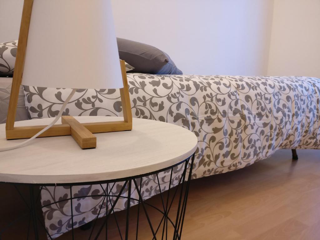 Postel nebo postele na pokoji v ubytování Garnì Al Laghet