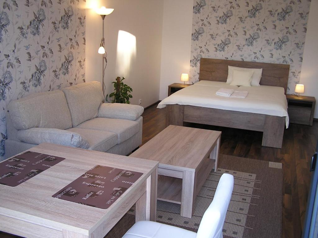 Postel nebo postele na pokoji v ubytování Gonda Apartments
