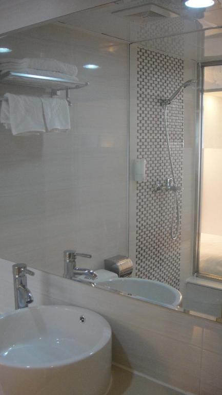 Koupelna v ubytování Guang Dong Hotel